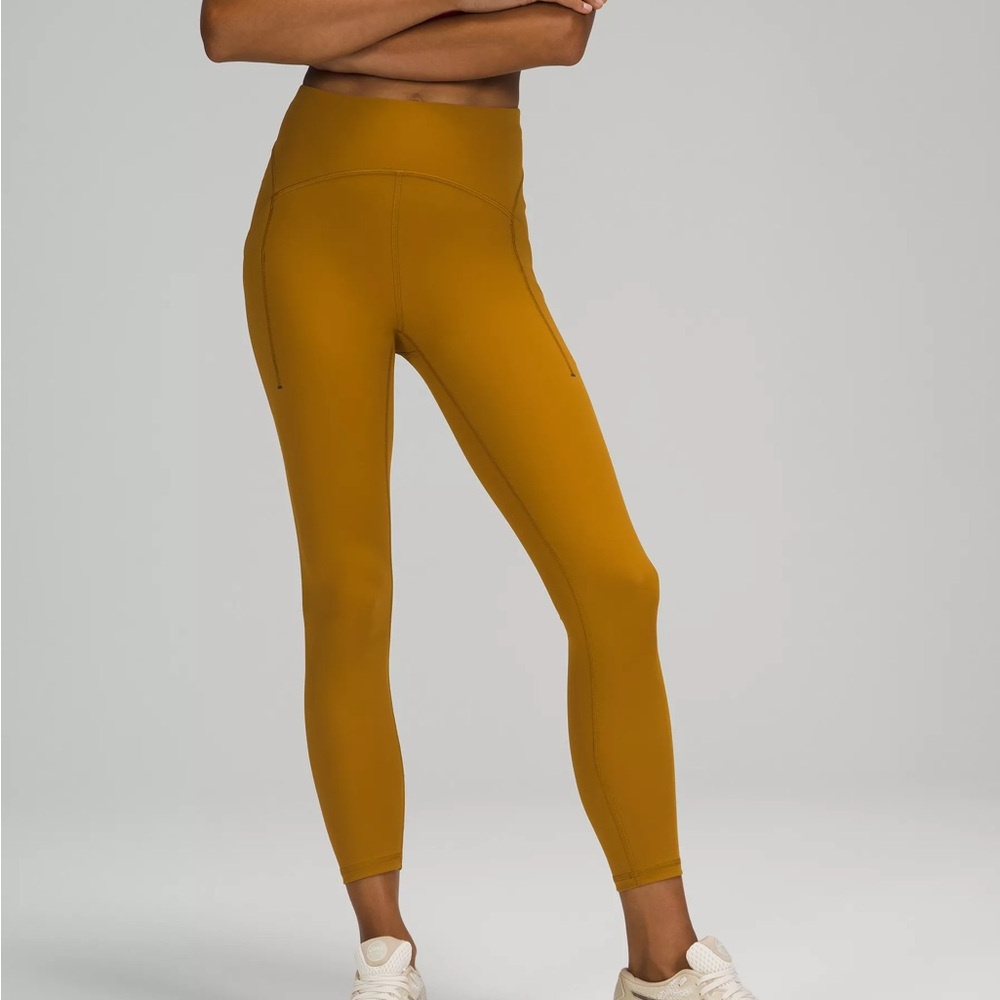 LULULEMON POWER THRU HIGH-RISE TIGHT 25" (color: gold spice)